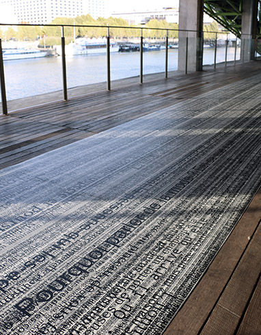 Text(e)~Fil(e)s, 2015 / Cité de la Mode et du Design, Paris, FR / Site-specific floor-print installation, pigment print on vinyl floor, 142 × 2.00 m
