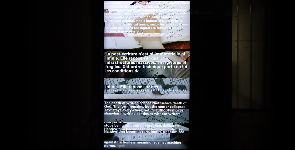 The End of Writing, 2026 / Exhibition view, L'Ososphere, Strasbourg, France, 2026 / Cut letter plates & algorithmically composed video installation on 3 screens / Video software : Claude Micheli